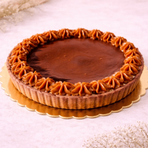 La Tartaleta Havanet combina una base de masa sablé crujiente con un corazón de dulce de leche y una cobertura de puro chocolate. Intensa y absolutamente deliciosa.